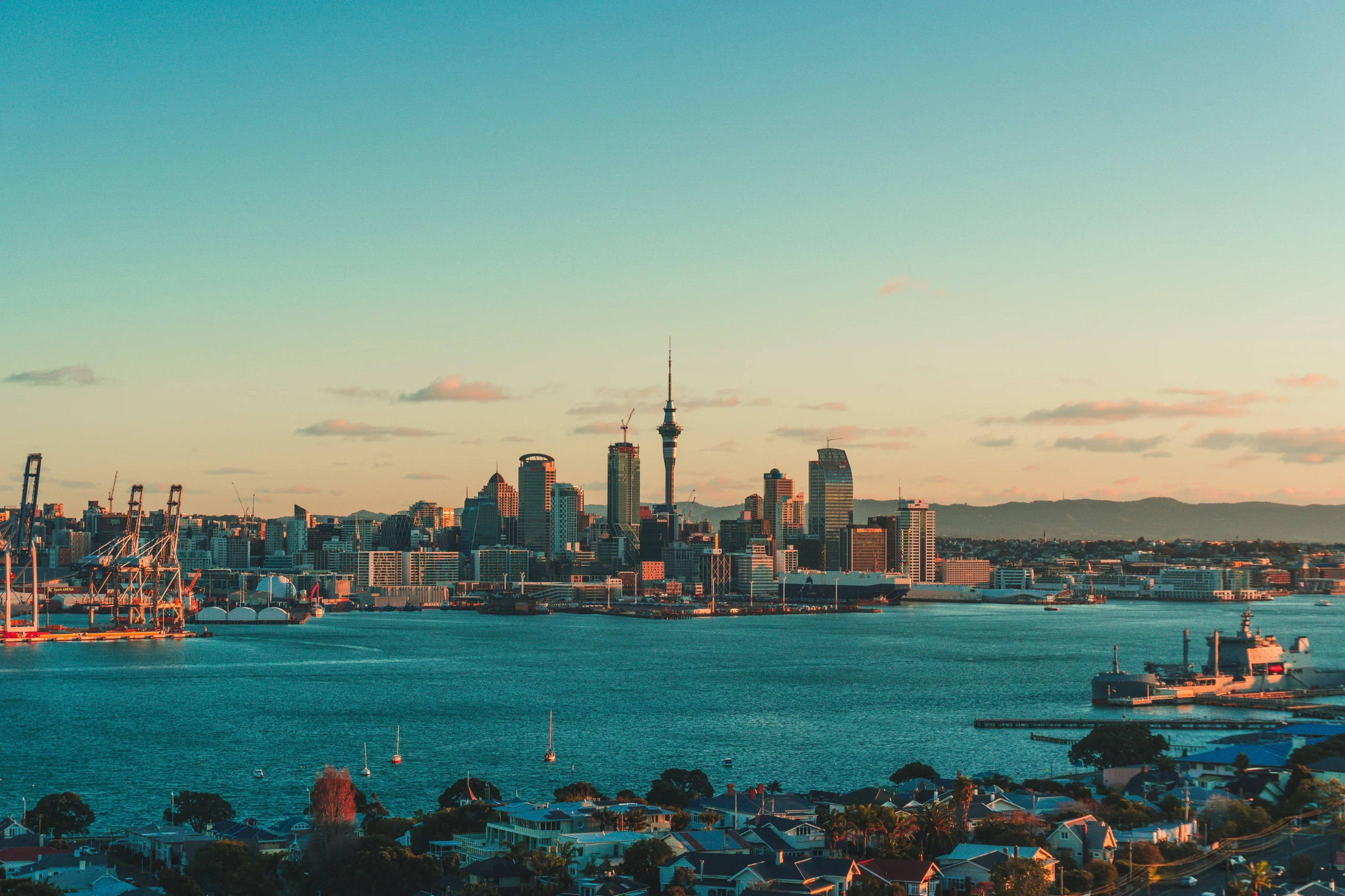 The Auckland skyline and the Sky Tower across the Waitemata at dusk